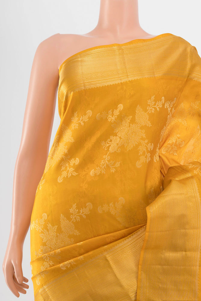 Border image of Yellow Kanjivaram Silk Saree with Zari Butta on the body and Silk Border. 
