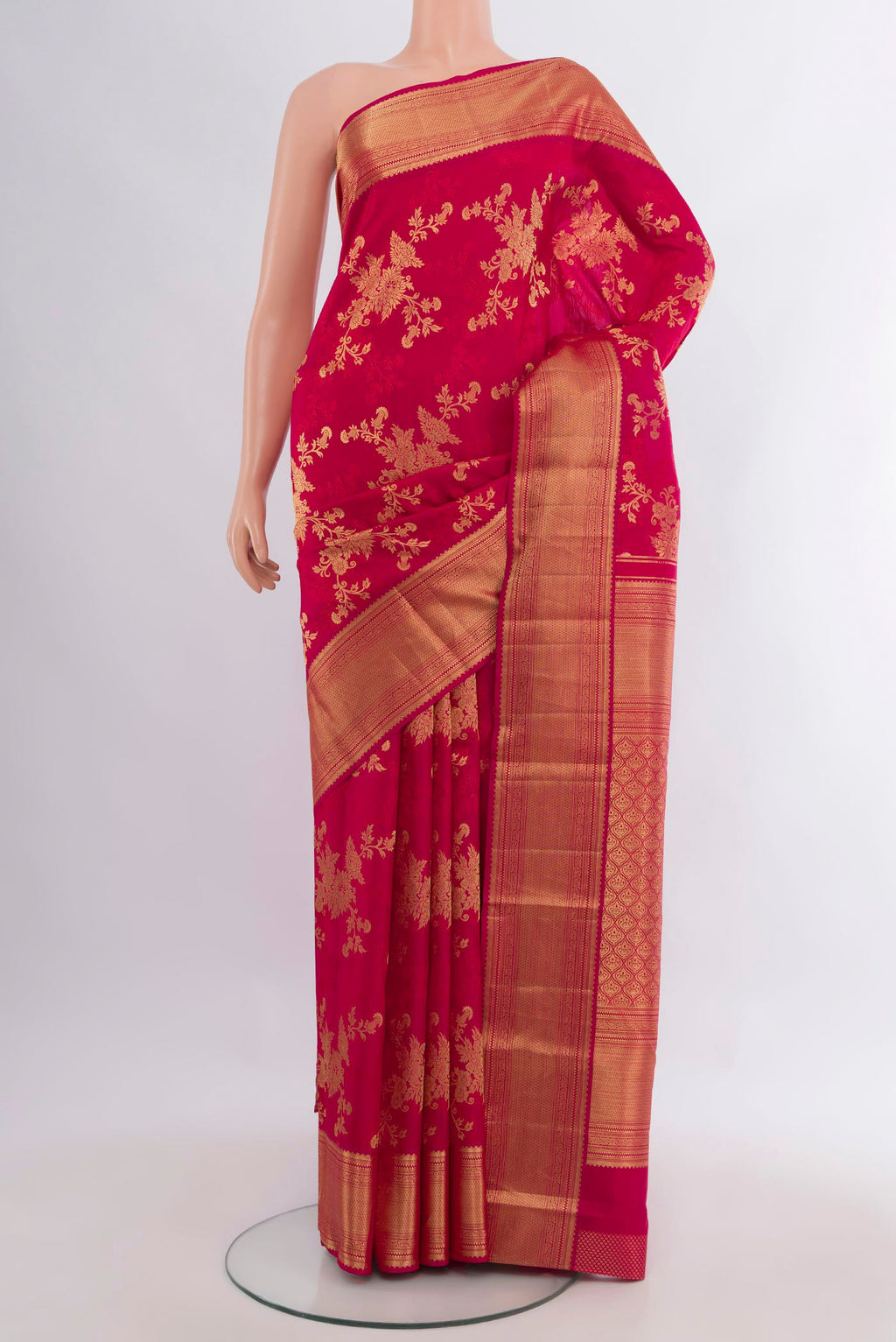 Pure Silk Dark Pink Kanjivaram Saree with Zari Brocade on the body and Zari Border.  displayed on a mannequin