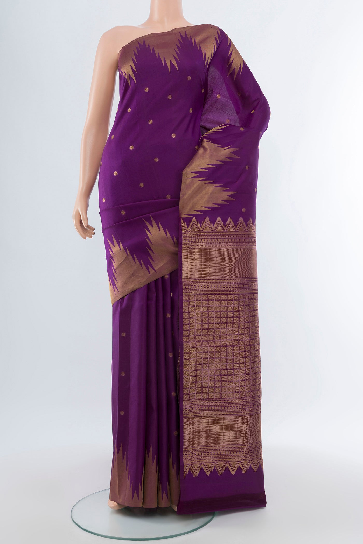 Pure Silk Pure Zari Violet Kanchipuram Saree with Zari Butta on the body and Silk Border.  displayed on a mannequin