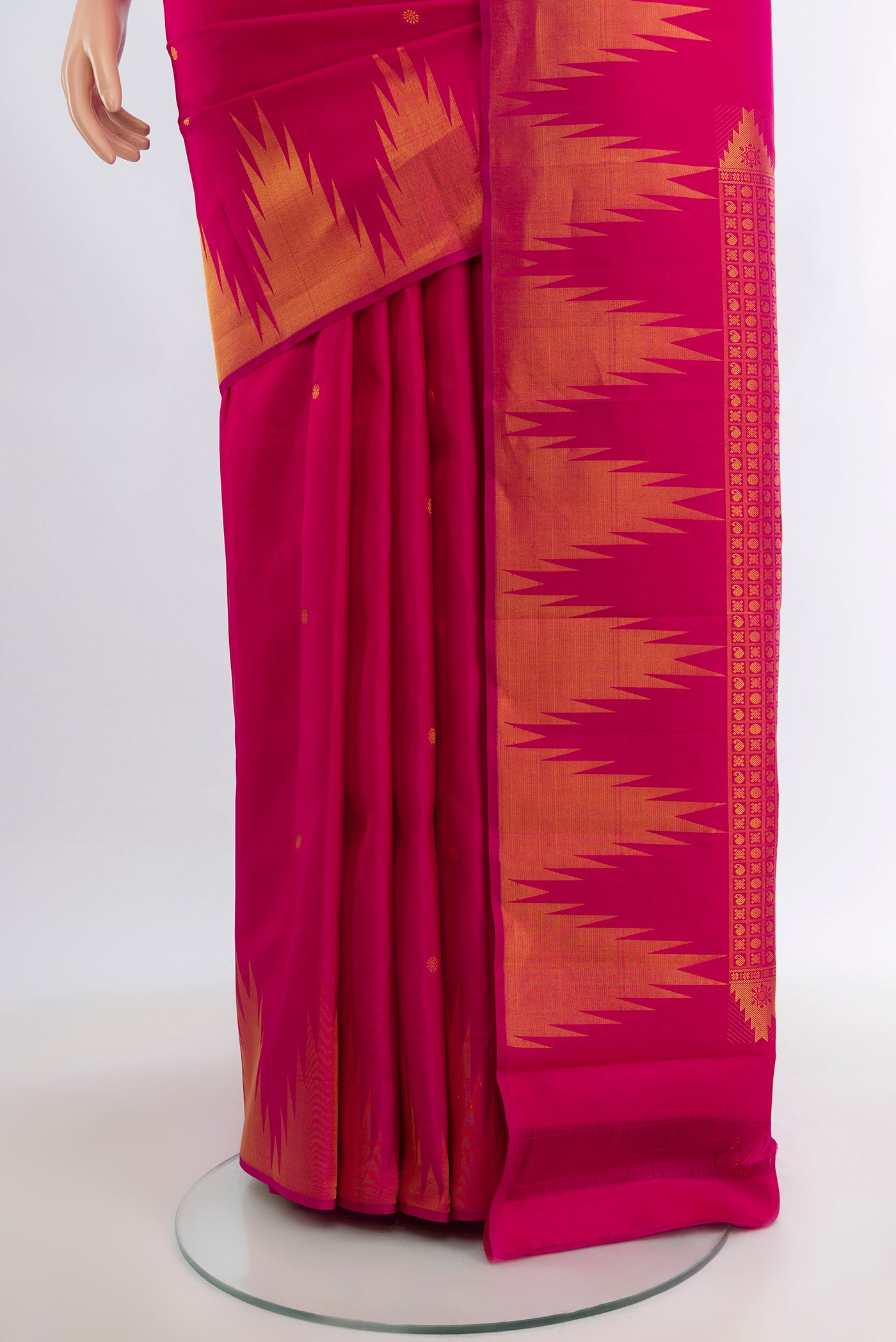 Pleats and pallu of Pink Kanchipuram Silk Saree with Zari Butta on the body and Temple Border. 