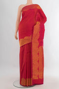 Pure Silk Imperial Red Kanchipuram Saree with Zari Butta on the body and Fancy Border.  displayed on a mannequin