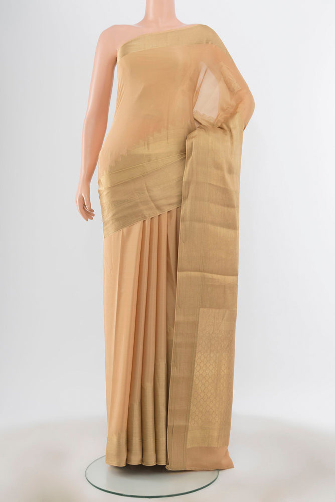 Golden Mysore Silk Saree with Zari Butta on the body and Silk Border.  displayed on a mannequin