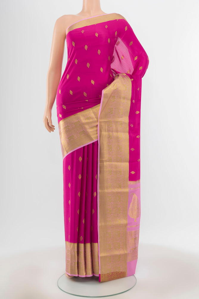 Purple Mysore Chiffon Saree with Zari Butta on the body and Silk Border.  displayed on a mannequin