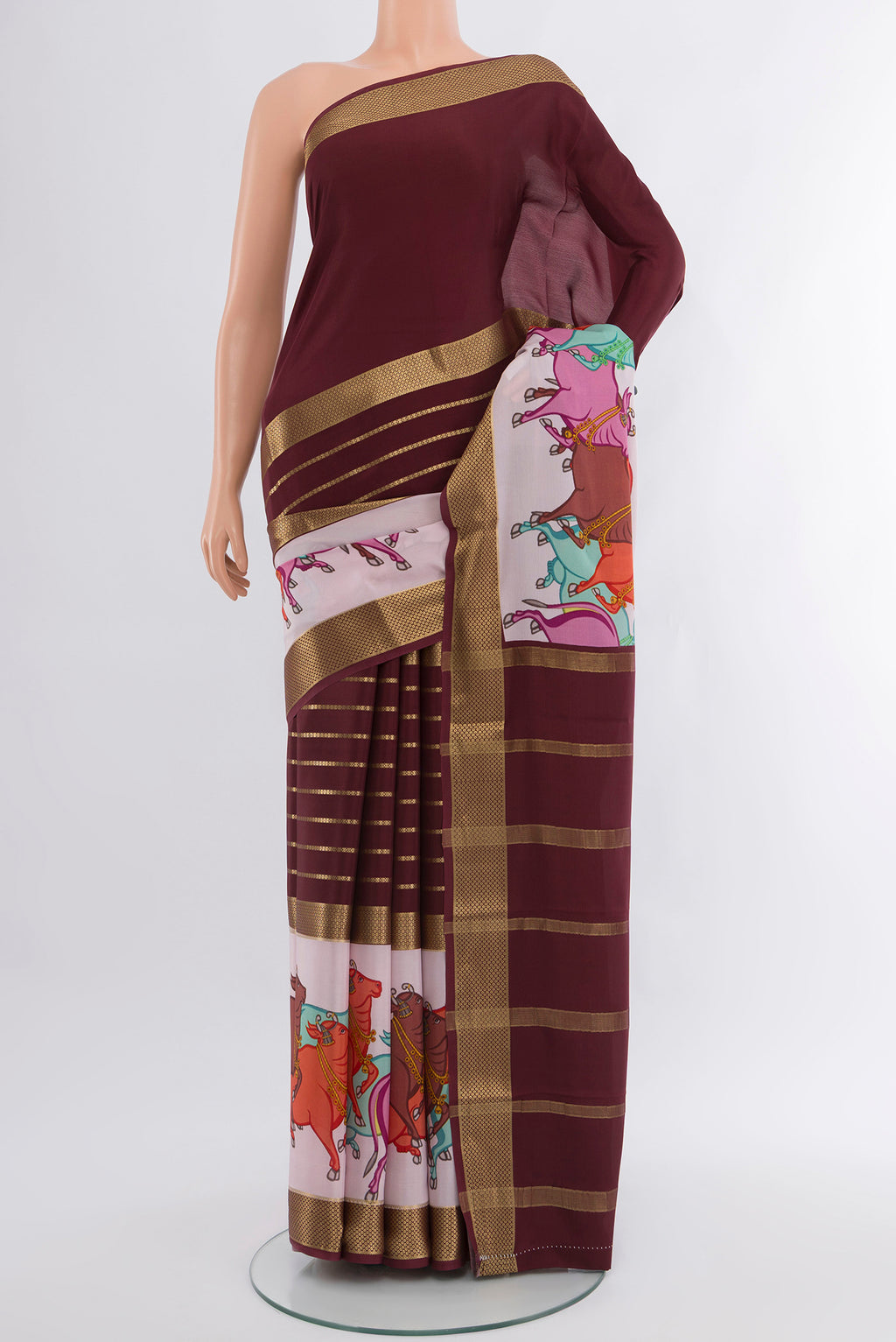 Coffee Brown Mysore Crepe Saree with Stripes on the body and Zari Border.  displayed on a mannequin