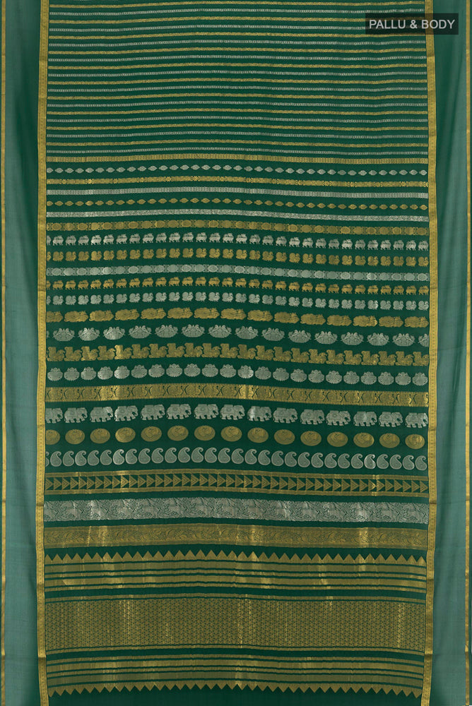 Flat view of Bottle Green Mysore Crepe Saree with Zari Butta on the body and Silk Border. 