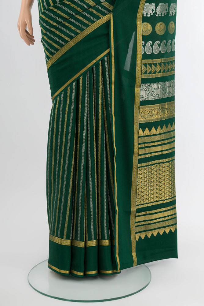 Pleats and pallu of Bottle Green Mysore Crepe Saree with Zari Butta on the body and Silk Border. 