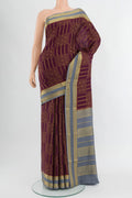 Coffee Brown Mysore Crepe Saree with Checked design on the body and Zari Border.  displayed on a mannequin