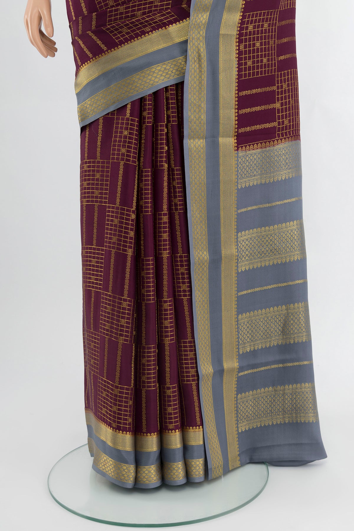 Pleats and pallu of Coffee Brown Mysore Crepe Saree with Checked design on the body and Zari Border. 