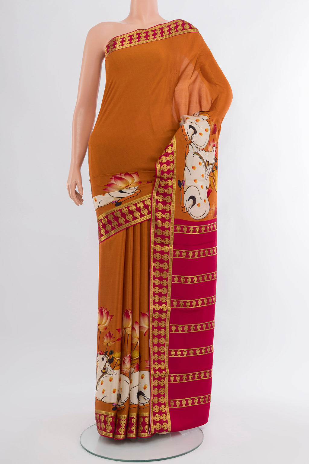 Mustard Mysore Crepe Saree with Plain Body and Zari Border.  displayed on a mannequin