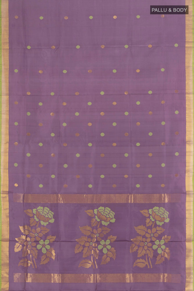 Flat view of Pure Silk Pure Zari Violet Uppada Saree with Zari Butta on the body and Silk Border. 