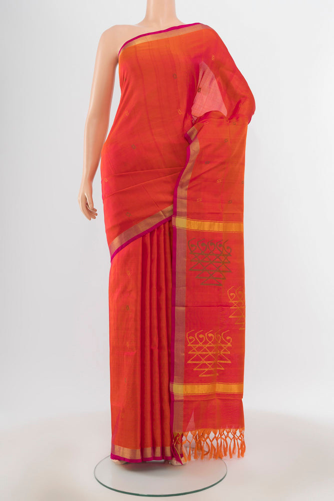 Pure Silk Pure Zari Peach Uppada Saree with Zari Butta on the body and Silk Border.  displayed on a mannequin