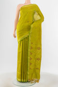 Light Green Uppada Silk Saree with Zari Brocade on the body and Silk Border.  displayed on a mannequin