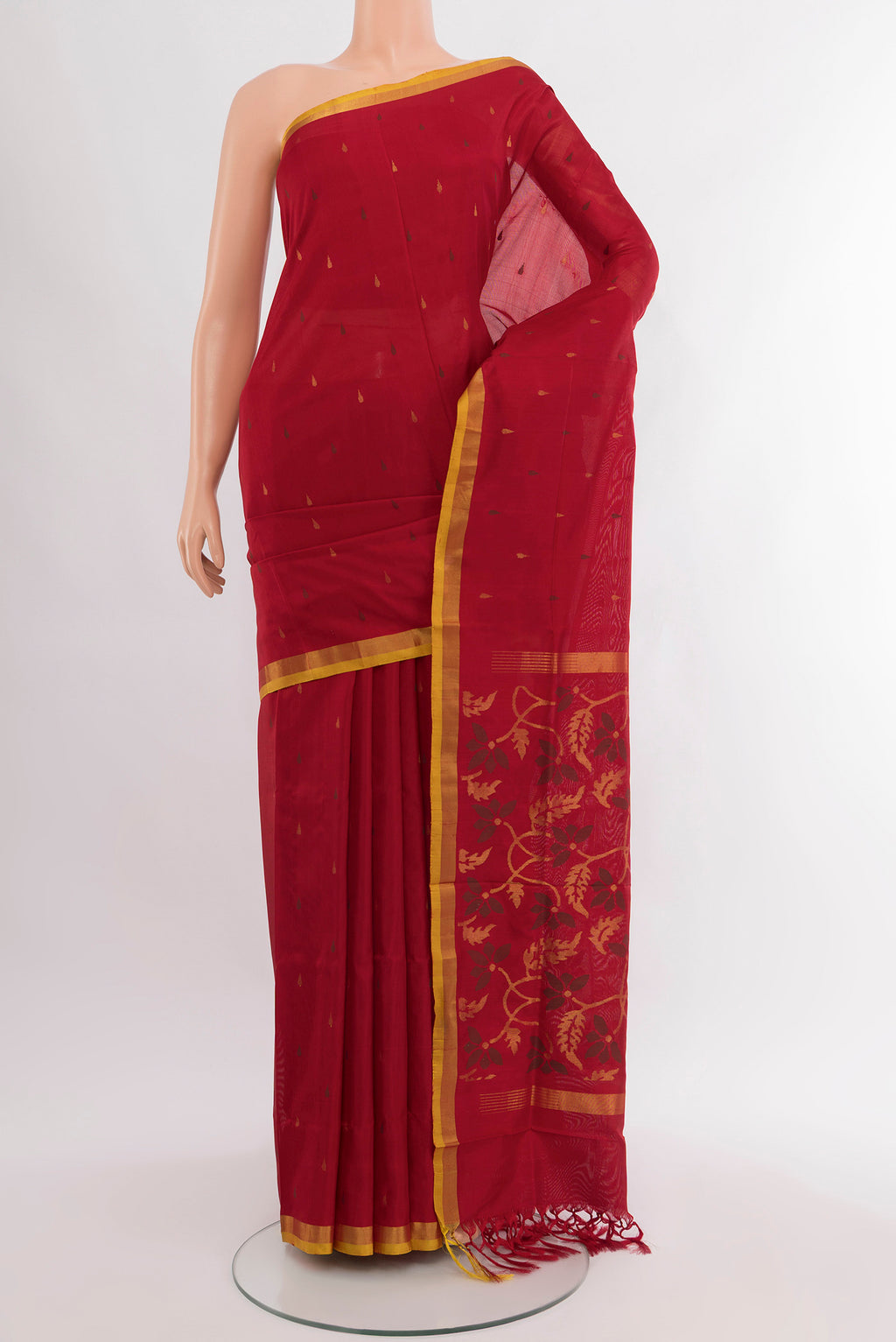 Pure Silk Pure Zari Maroon Uppada Saree with Zari Butta on the body and Silk Border.  displayed on a mannequin