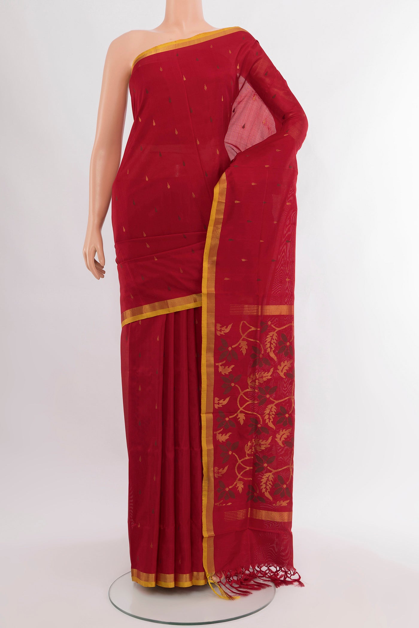 Pure Silk Pure Zari Maroon Uppada Saree with Zari Butta on the body and Silk Border.  displayed on a mannequin