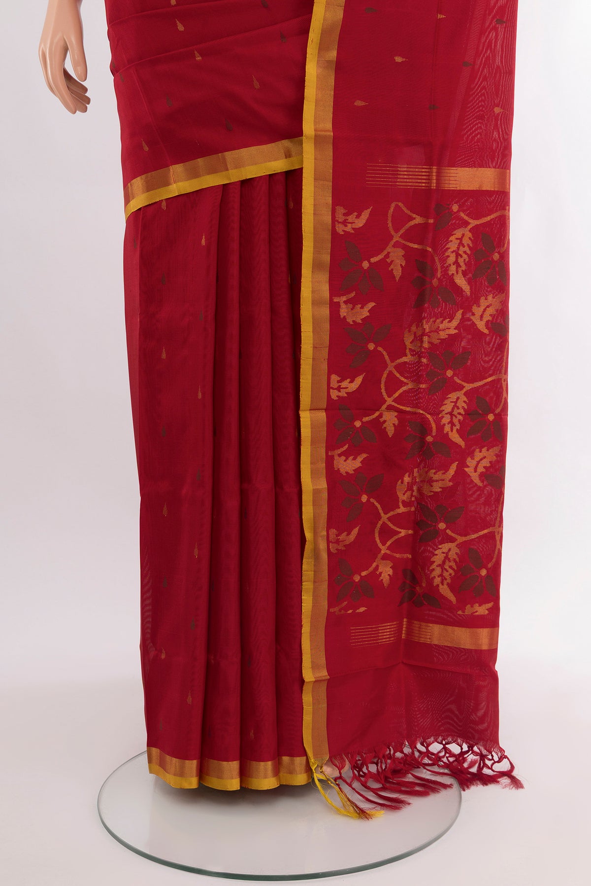Pleats and pallu of Pure Silk Pure Zari Maroon Uppada Saree with Zari Butta on the body and Silk Border. 