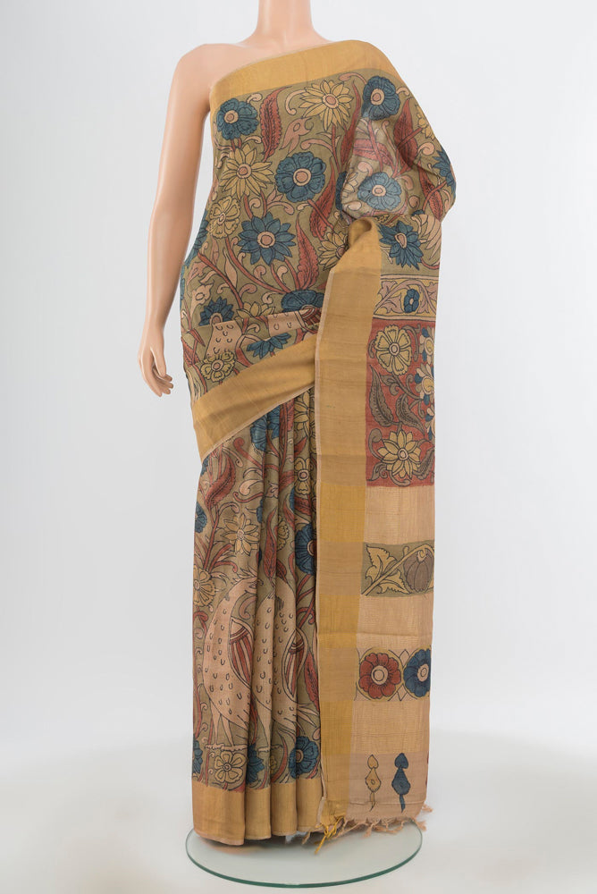 Pure Silk Pure Zari Multi Color Tussar Saree with kalamkari Print on the body and Silk Border.  displayed on a mannequin
