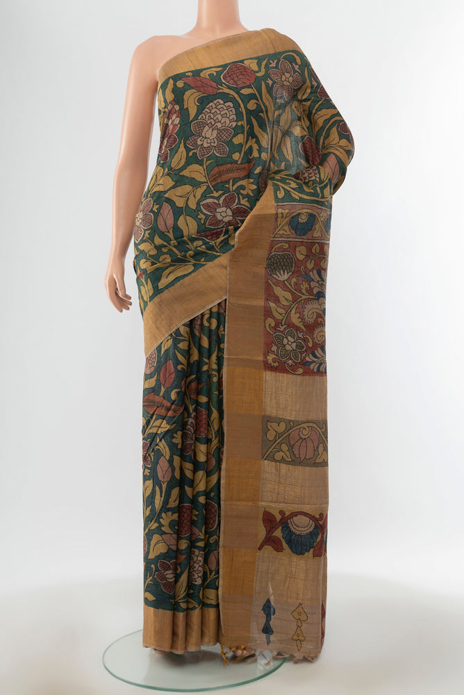 Pure Silk Pure Zari Multi Color kalamkari Saree with kalamkari Print on the body and Silk Border.  displayed on a mannequin