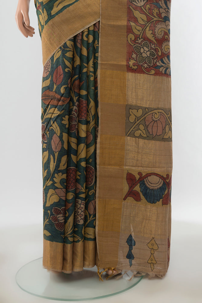 Pleats and pallu of Pure Silk Pure Zari Multi Color kalamkari Saree with kalamkari Print on the body and Silk Border. 