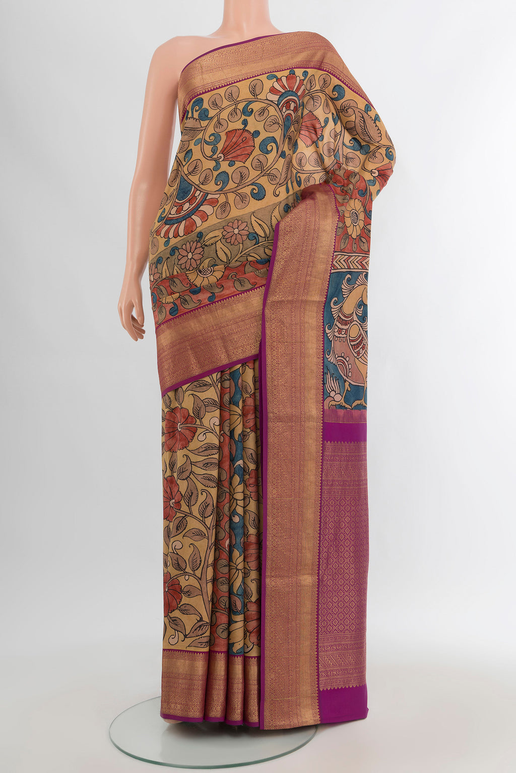 Beige Kanjivaram Silk Saree with Floral Print on the body and Zari Border.  displayed on a mannequin