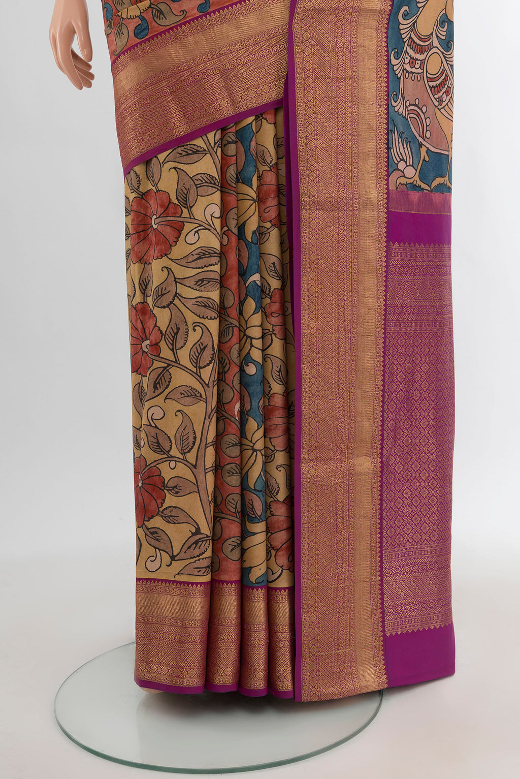 Pleats and pallu of Beige Kanjivaram Silk Saree with Floral Print on the body and Zari Border. 