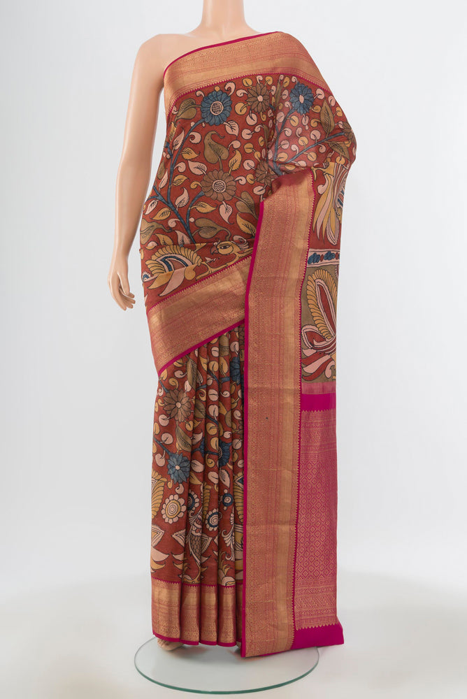 Pure Silk Pure Zari Multi Color Tussar Saree with kalamkari Print on the body and Silk Border.  displayed on a mannequin