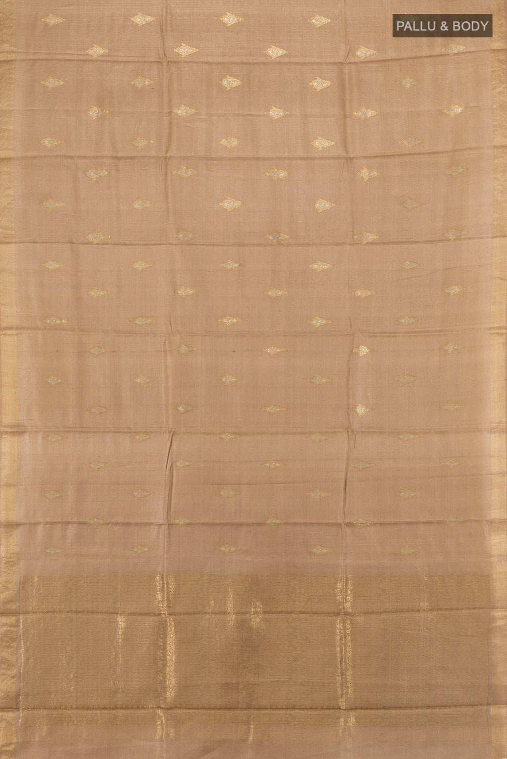 Flat view of Beige Tussar Saree with Zari Butta on the body and Zari Border. 