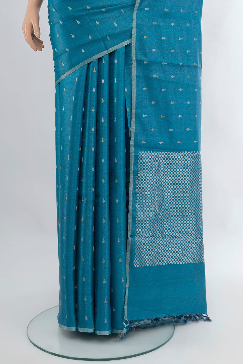 Pleats and pallu of Sky Blue Tussar Silk Saree with Zari Butta on the body and Plain Border. 