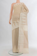 Pure Silk Cream Tussar Saree with Plain Body and Temple Border.  displayed on a mannequin