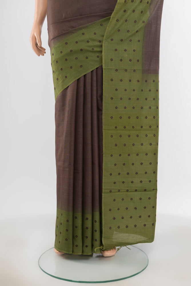 Pleats and pallu of Pure Silk Pure Zari Brown Tussar Saree with Zari Butta on the body and Silk Border. 