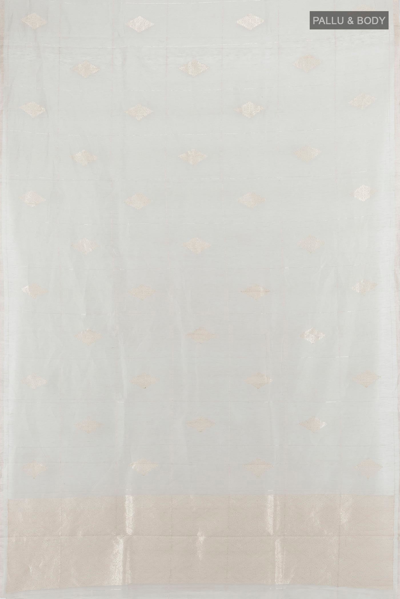 Flat view of Grey Tussar Saree with Zari Butta on the body and Without Border. 