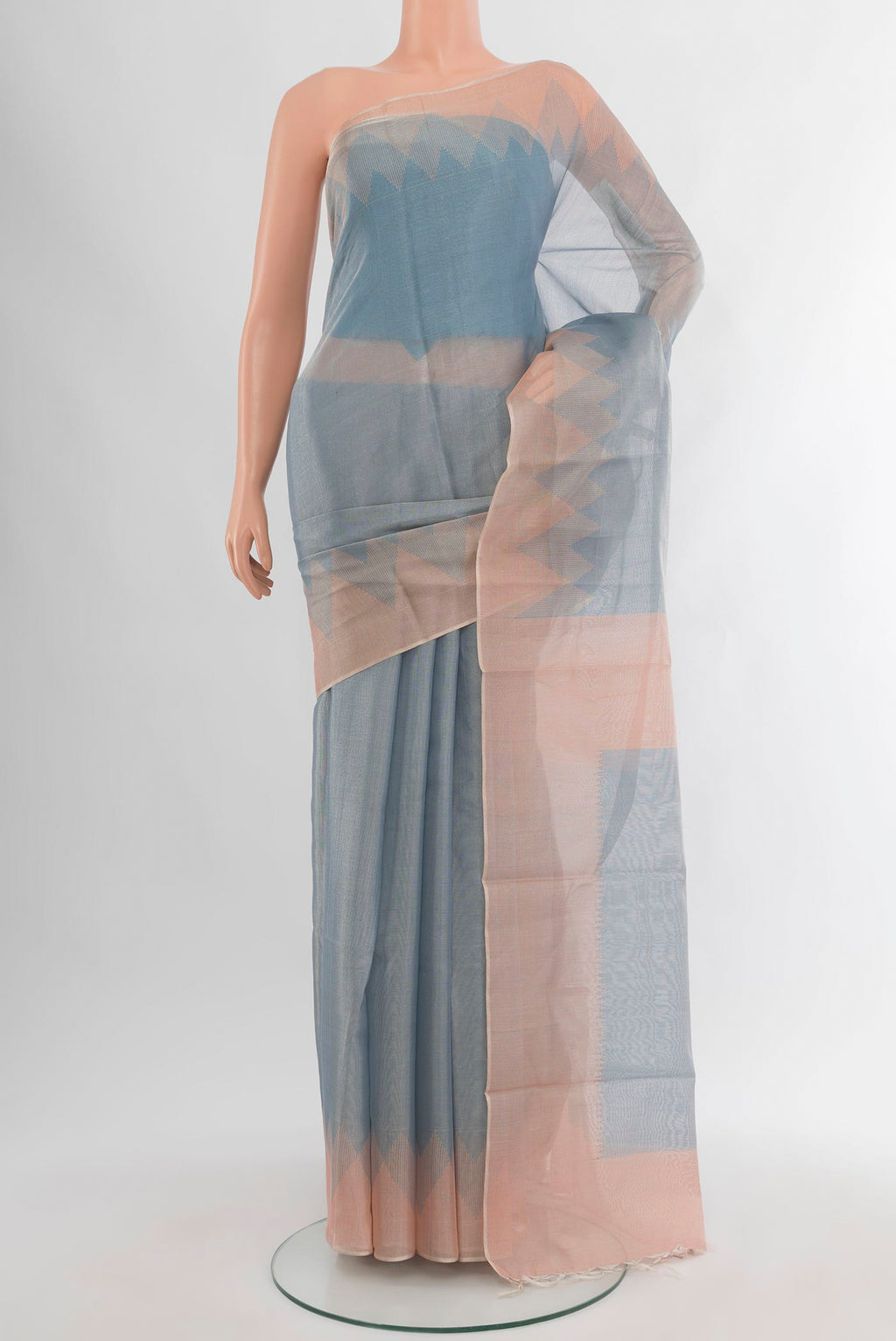 Blue Tussar Silk Saree with Plain Body and Temple Border.  displayed on a mannequin