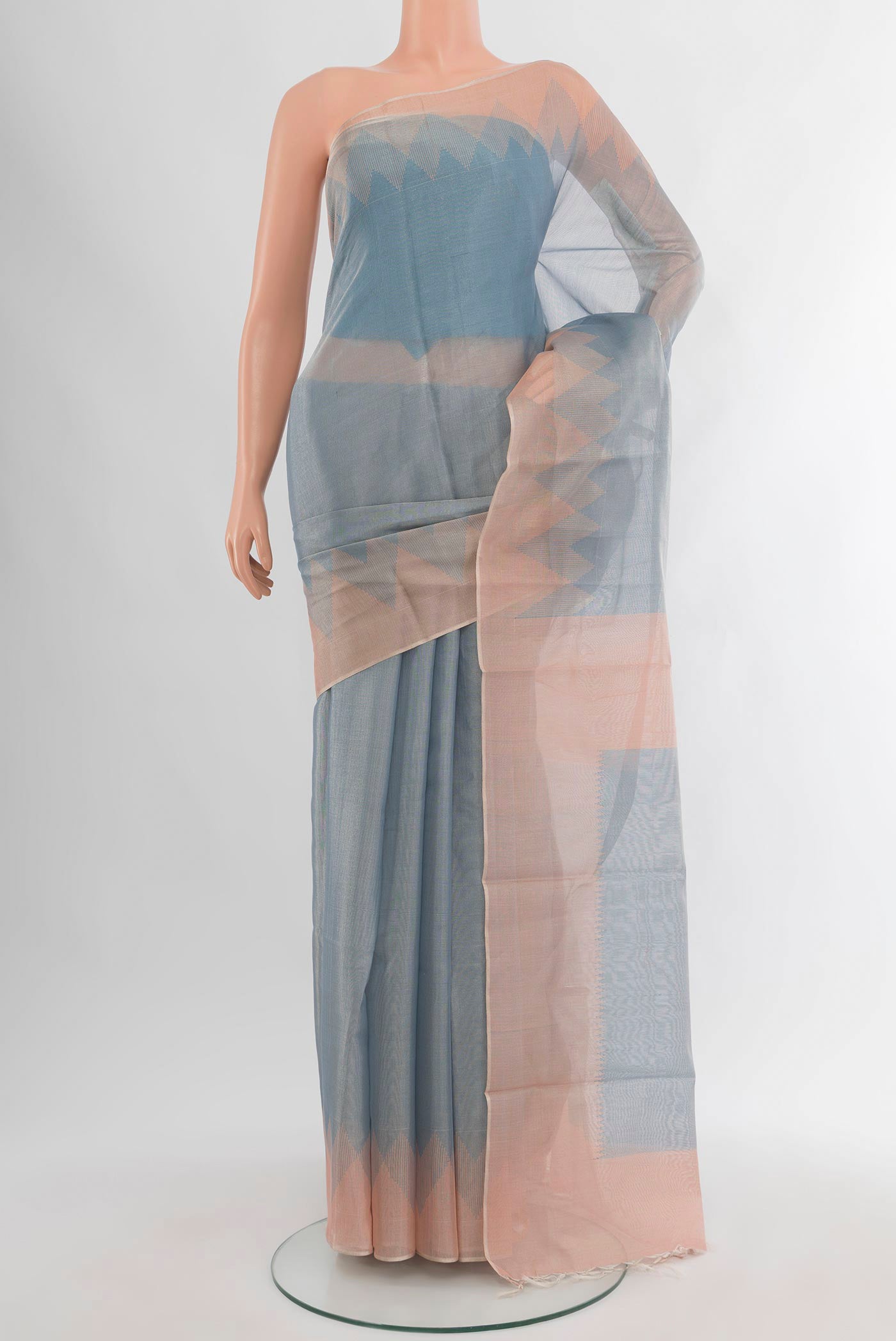 Blue Tussar Silk Saree with Plain Body and Temple Border.  displayed on a mannequin