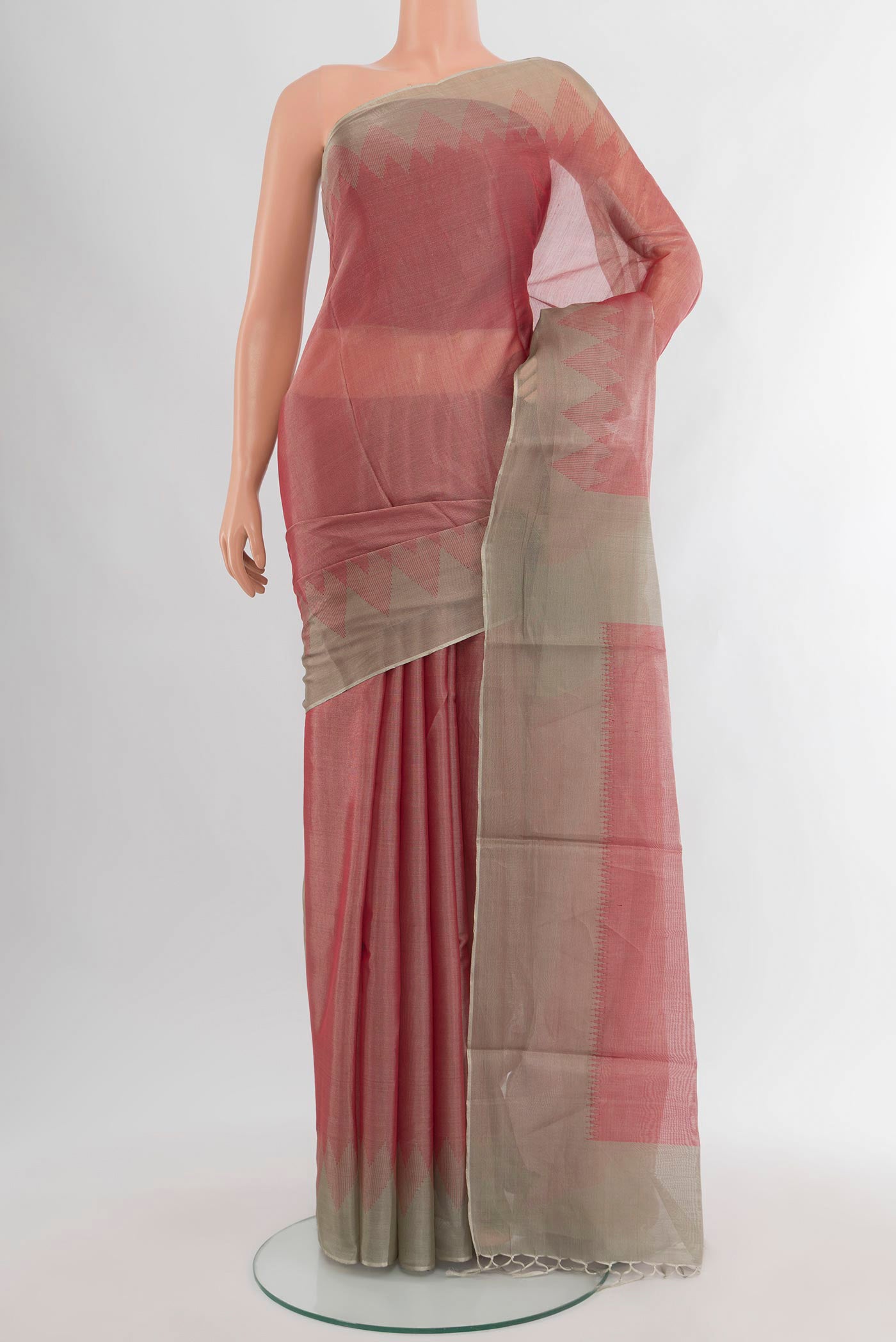 Rose Gold Tussar Silk Saree with Plain Body and Temple Border.  displayed on a mannequin