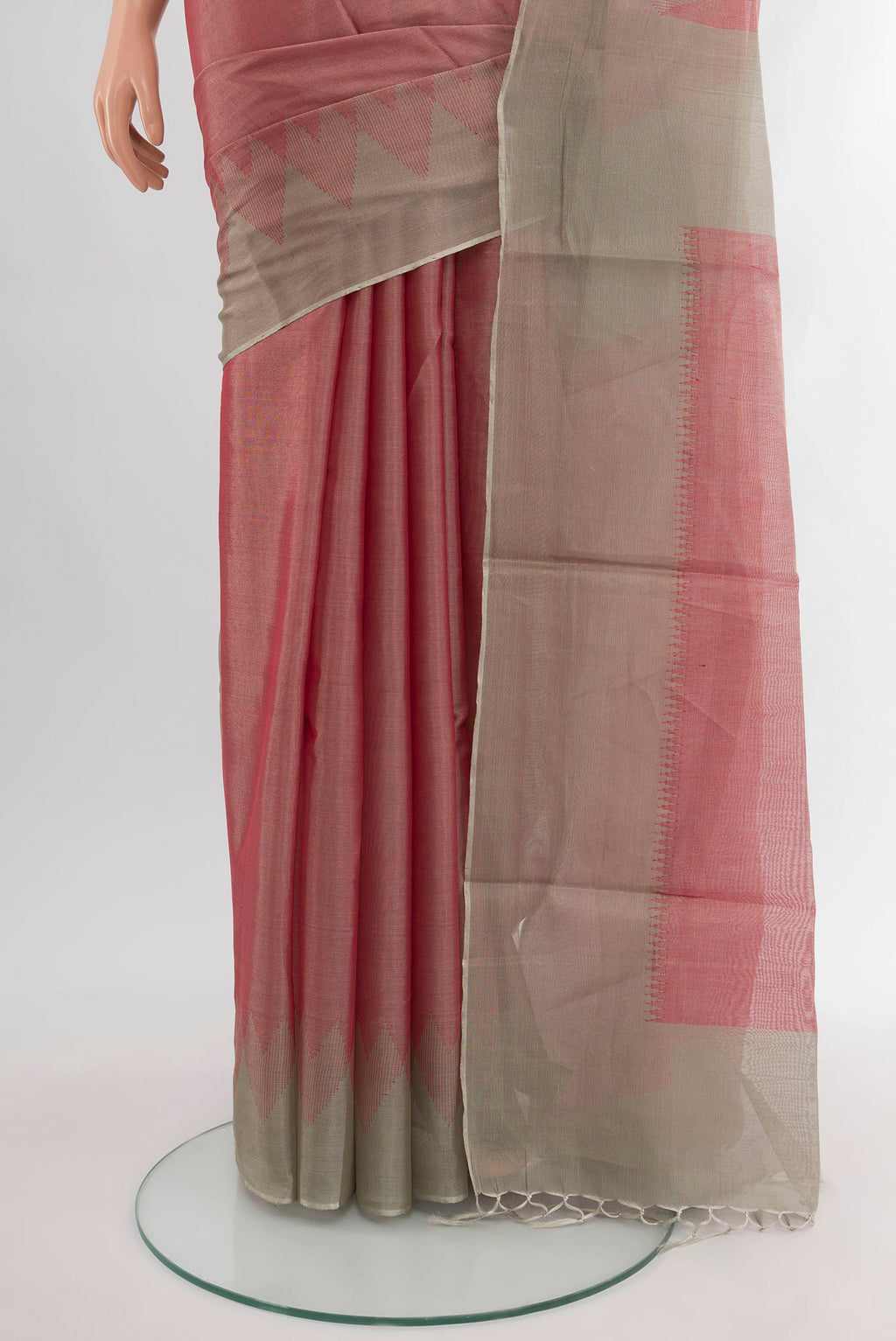 Pleats and pallu of Rose Gold Tussar Silk Saree with Plain Body and Temple Border. 