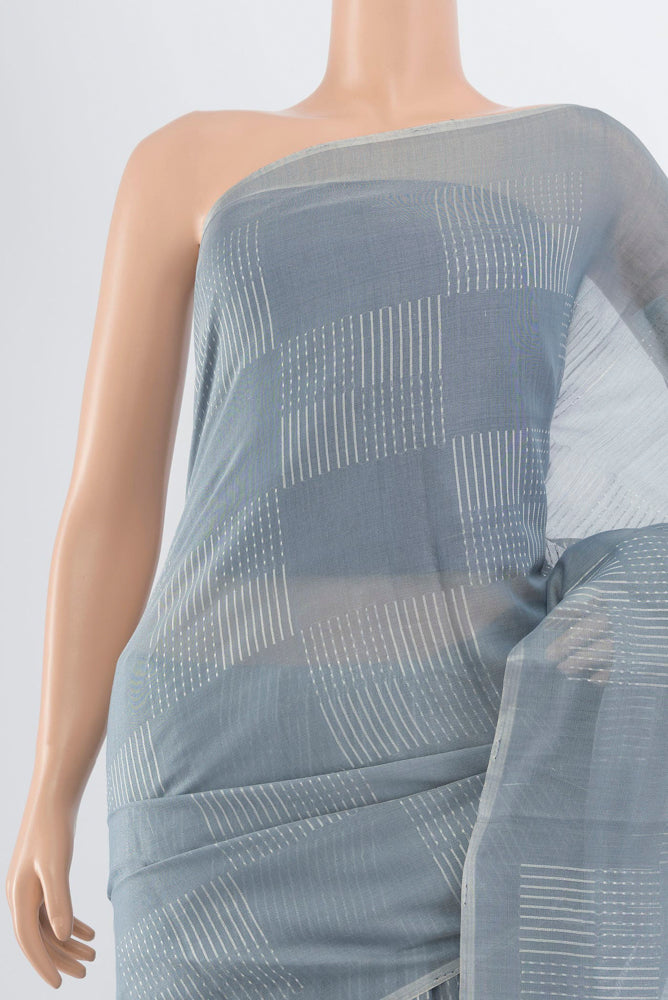 Border image of Pure Silk Pure Zari Davys Grey Tussar Saree with Zari Butta on the body and Silk Border. 