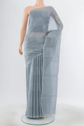 Pure Silk Pure Zari Davys Grey Tussar Saree with Zari Butta on the body and Silk Border.  displayed on a mannequin