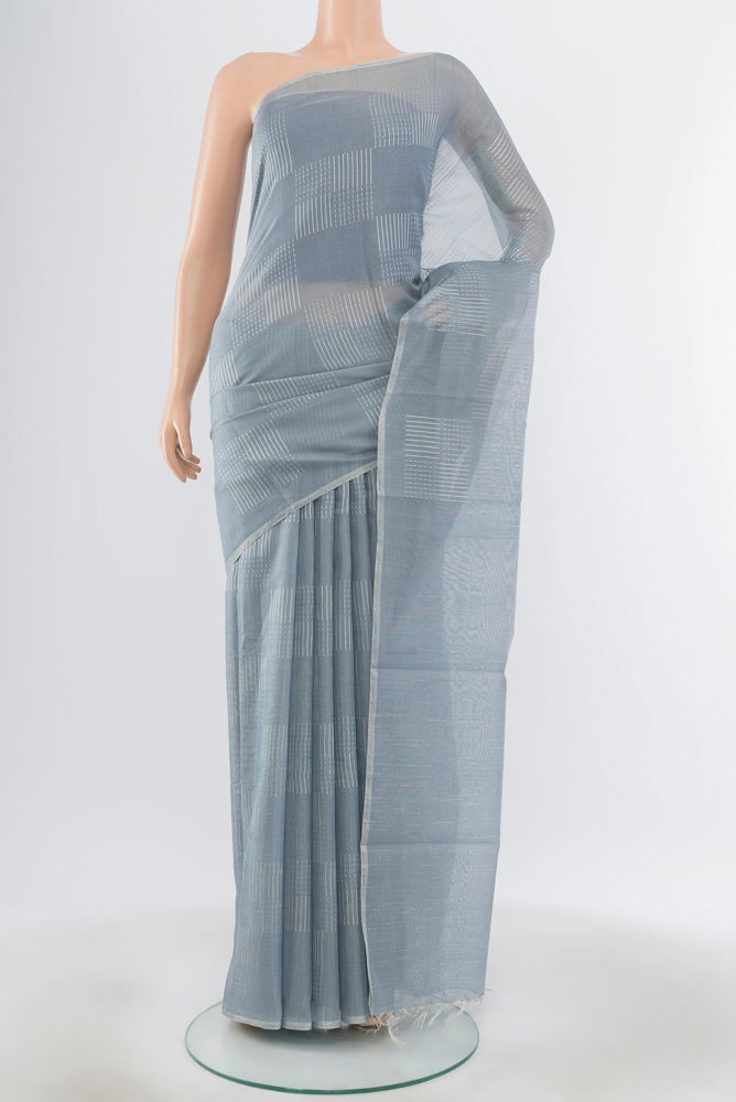 Pure Silk Pure Zari Davys Grey Tussar Saree with Zari Butta on the body and Silk Border.  displayed on a mannequin