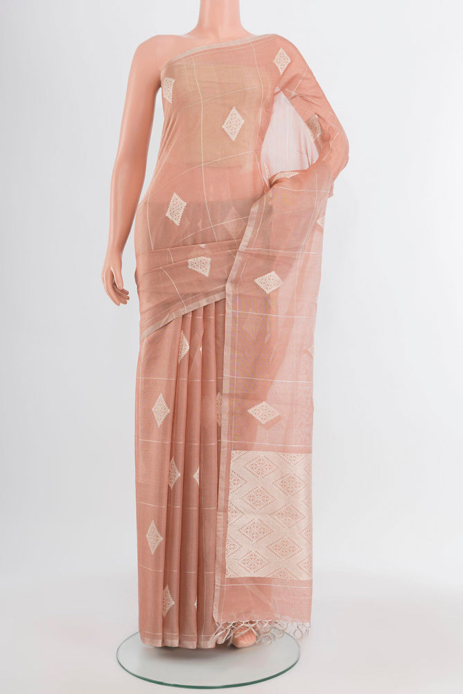 Bronze Tussar Silk Saree with Zari Butta on the body and Silk Border.  displayed on a mannequin
