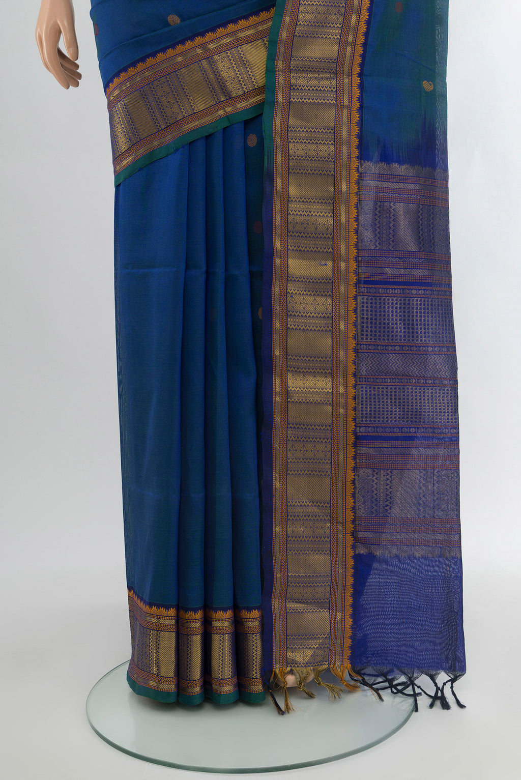 Pleats and pallu of Peacock Blue Silk Cotton Saree with Thread Butta on the body and Zari Border. 