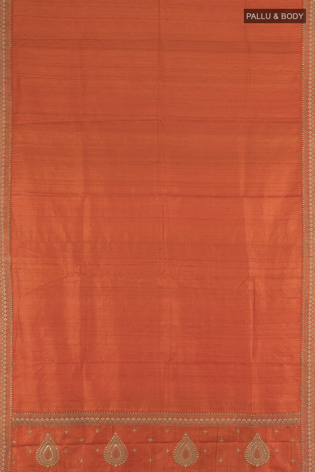 Flat view of Rust Tussar Silk Saree with Plain Body and Embroidery Border. 