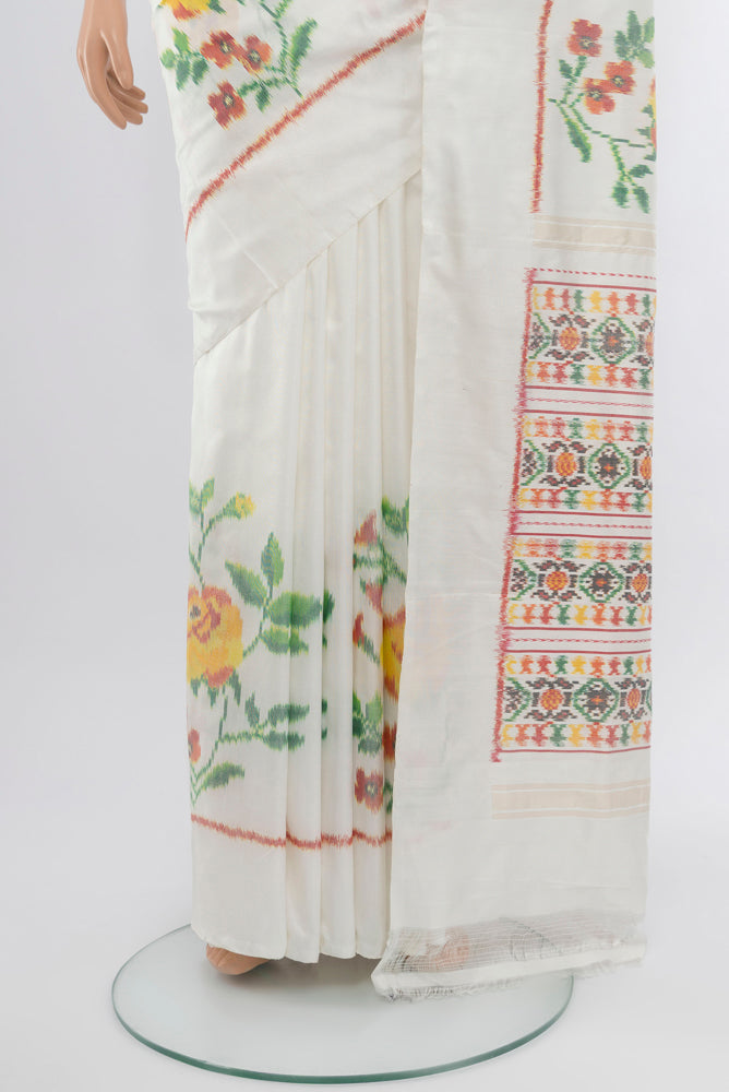 Pleats and pallu of Off White Rajkot Patola Silk Saree with Ikat Print on the body and Silk Border. 