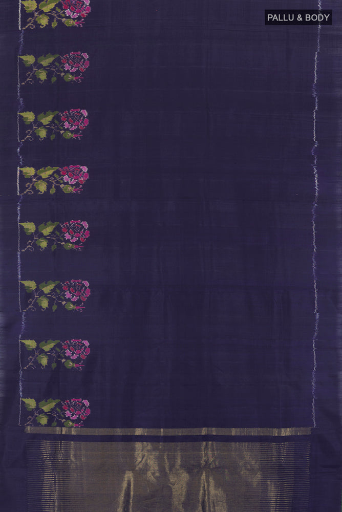 Flat view of Navy Blue Rajkot Patola Silk Saree with Ikat Print on the body and Silk Border. 