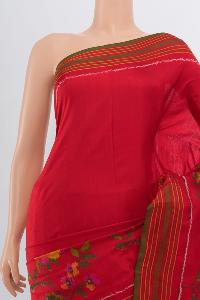 Border image of Red Rajkot Patola Silk Saree with Ikat Print on the body and Silk Border. 