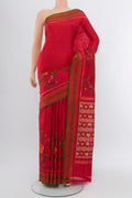 Red Rajkot Patola Silk Saree with Ikat Print on the body and Silk Border.  displayed on a mannequin