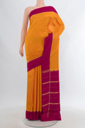 Pure Silk Pure Zari Yellow Mysore Crepe Saree with Plain Body and Plain Border.  displayed on a mannequin