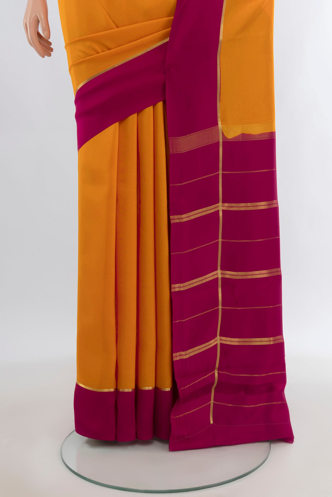 Pleats and pallu of Pure Silk Pure Zari Yellow Mysore Crepe Saree with Plain Body and Plain Border. 