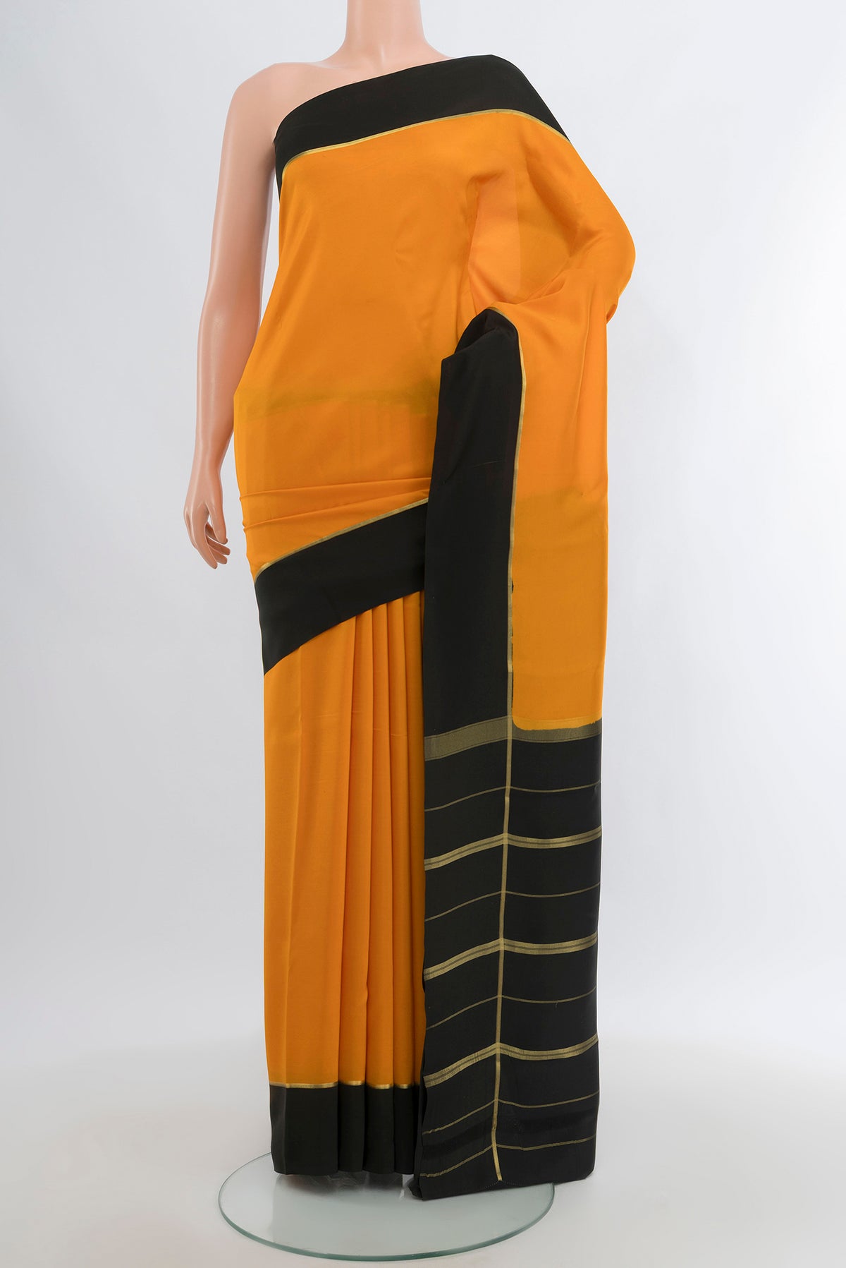 Pure Silk Pure Zari Yellow Mysore Crepe Saree with Plain Body and Plain Border.  displayed on a mannequin