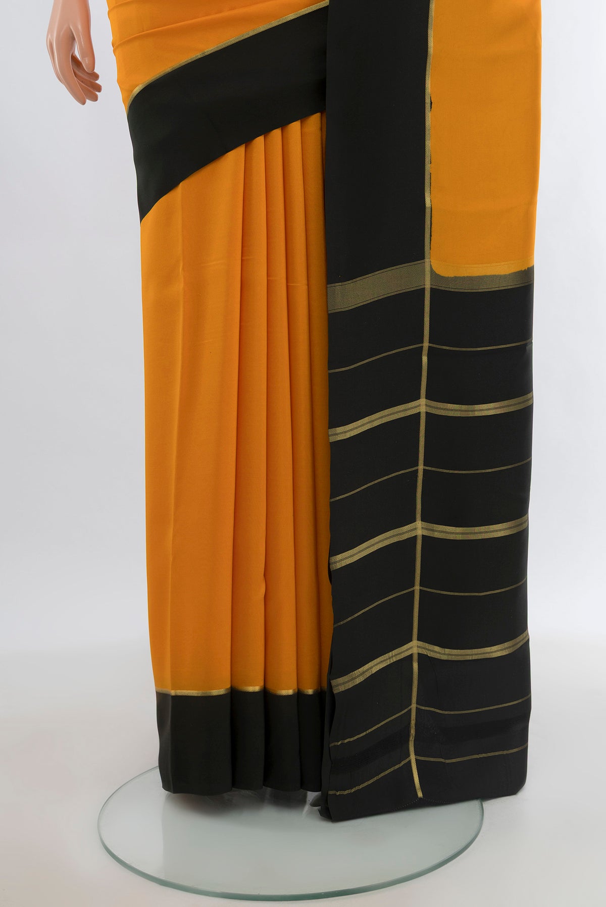 Pleats and pallu of Pure Silk Pure Zari Yellow Mysore Crepe Saree with Plain Body and Plain Border. 