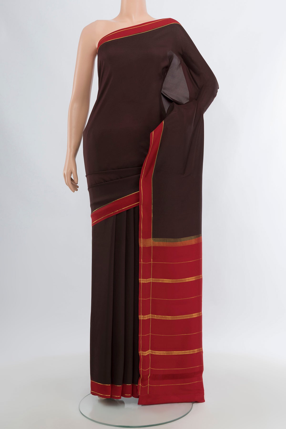 Pure Silk Pure Zari Coffee Brown Mysore Crepe Saree with Plain Body and Rising Temple Border.  displayed on a mannequin
