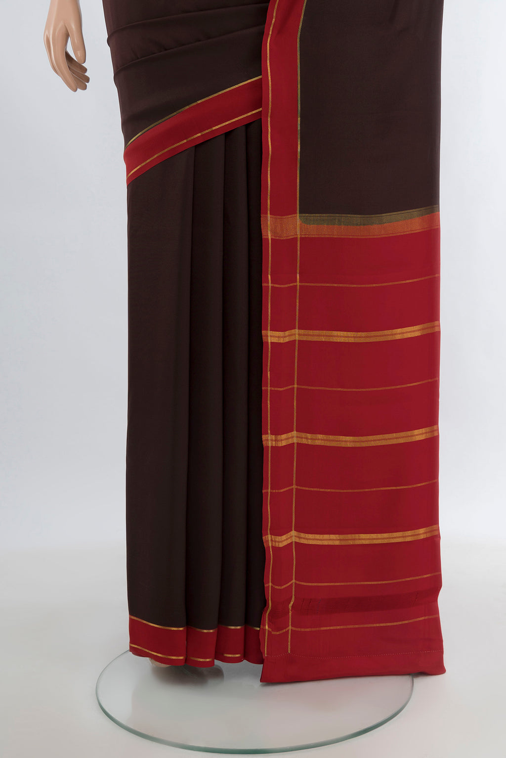 Pleats and pallu of Pure Silk Pure Zari Coffee Brown Mysore Crepe Saree with Plain Body and Rising Temple Border. 
